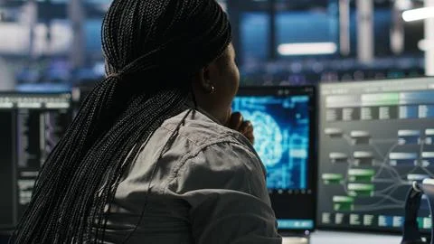 Data center software developer using artificial intelligence deep learning model Stock Photos