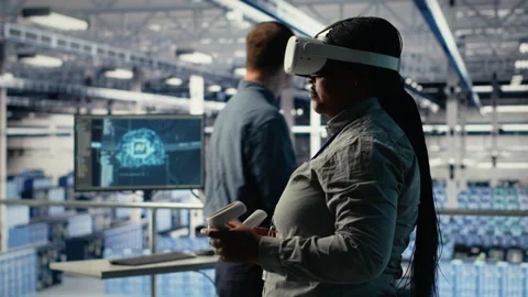 Data center software developers deploy machine learning software Stock Footage 314686230