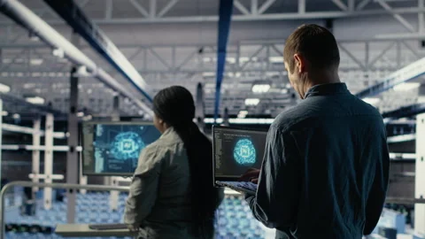 Data center software developers monitoring deep learning processes Stock Footage 314685388