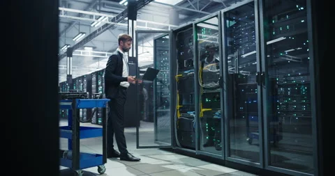 Data Center Specialist Using Laptop Computer Stock Footage 320865863
