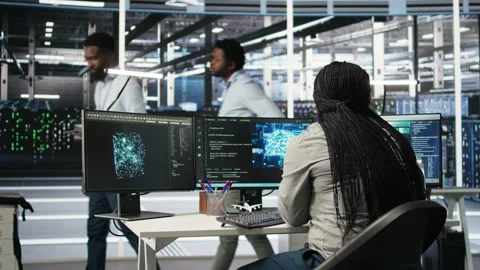 Data center staff member in office using AI deep learning algorithms Stock Footage 307044094