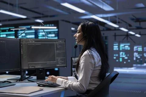 Data center support expert helping engineering team doing equipment maintenance Stock Photos