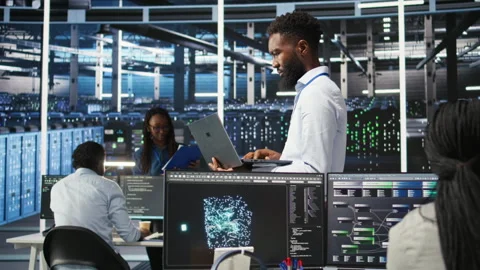 Data center system administrator analyzing gear issues using node tree tools Video stock 307015803