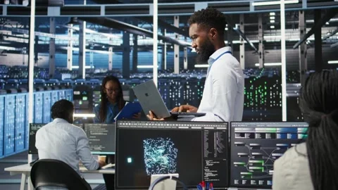 Data center system administrator analyzing gear issues using node tree tools Stock Footage 309122878
