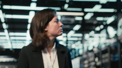 Data center system administrator doing inspection Stock Footage 330098635