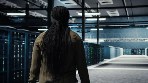Data center system administrator oversees IT gear Stock Footage 317204796