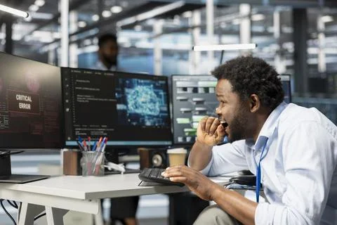 Data center system administrator panics, seeing glitch warning while using AI Stock Photos