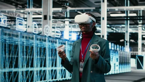 Data center system administrator uses VR headset gear and AR simulation Stock Footage 329531886
