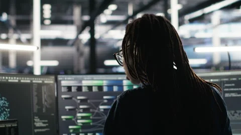 Data center system administrator using node tree software to analyze datasets Stock Footage 307024040
