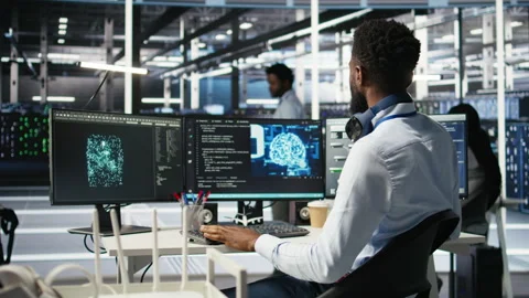 Data center system administrator using AI neural network models Stock Footage 307040490