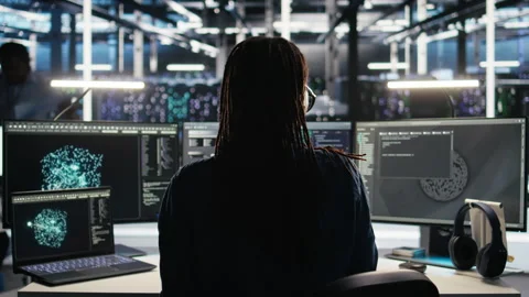 Data center system administrator using algorithms to analyze large datasets Stock-Footage 307042412