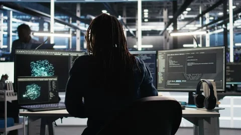 Data center system administrator using node tree software to analyze datasets Stock Footage 309129541