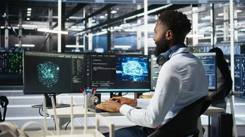 Data center system administrator using AI neural network models Fotos de archivo