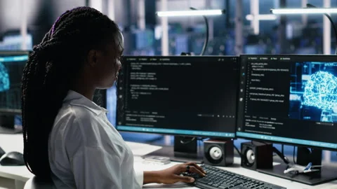 Data center system administrator working on neural network tech Stock Footage 313635953