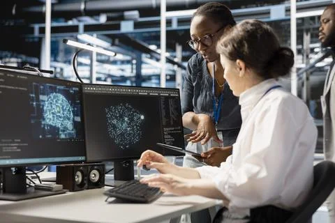 Data center system administrators using artificial intelligence Stock Photos