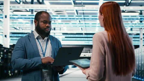 Data center team of technicians uses AI deep learning on devices Stock Footage 330205655