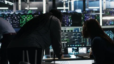 Data center teamworking colleagues use node tree program Stock Photos