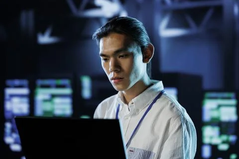 Data center tech support runs code Stock Photos