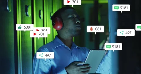 Data center tech tapping tablet and monitoring growing alert bubbles around Stock Footage 331634350