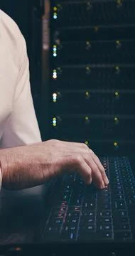 Data center, technician and hands with keyboard, typing and network engineering Stock Photos