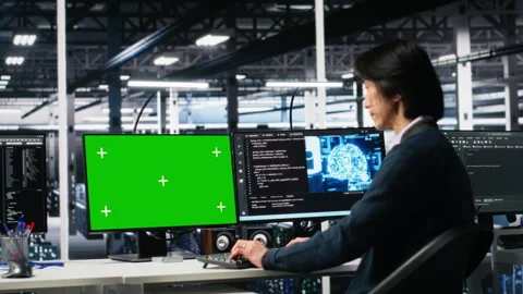Data center technician managing AI systems using mockup PC Stock Footage 313566934