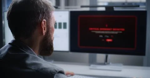 Data Center Technician Resolving Critical Server Overheating Alert Stock Photos