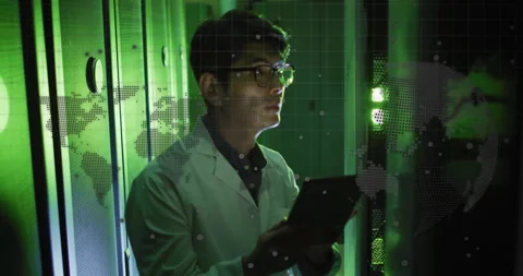 Data center technician scrolling tablet viewing grid tapping screen to confirm Stock Footage 312638932