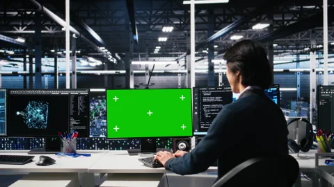 Data center technician uses machine learning algorithms on isolated screen PC Stock Footage 313638404