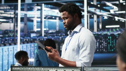 Data center technician uses node tree programming to identify performance issues Stock Footage 307019717