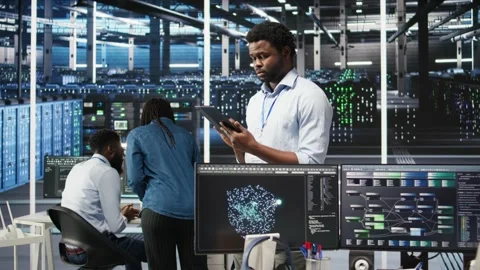 Data center technician uses node tree programming to identify performance issues Stock Footage 309111882