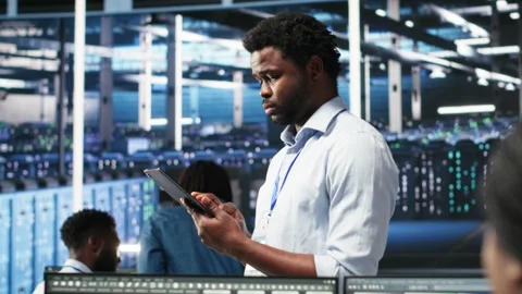 Data center technician uses node tree programming to identify performance issues Stock Footage 309114142