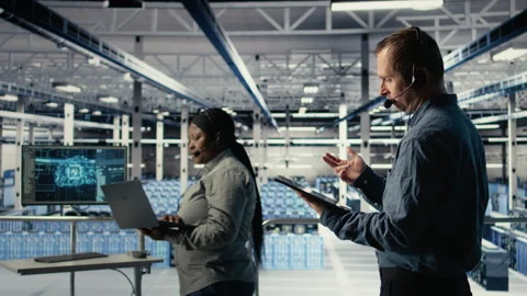 Data center technician using AI on tablet to help customers resolve problems Stock Footage 314804349