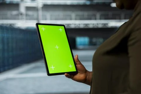 Data center technician using green screen tablet to automate anomaly detection Stock Photos