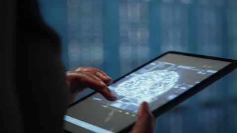 Data center technician using machine learning on tablet to optimize operations Stock Footage 317204902