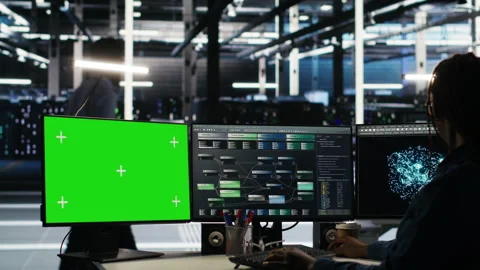 Data center technician using node tree software on mockup PC to analyze datasets Stock Footage 307028034