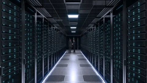 Data center two IT Engineers working Video stock 89987104