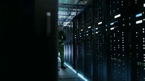In Data Center Two Military Men Work with Open Server Rack Cabinet.  Stock Footage