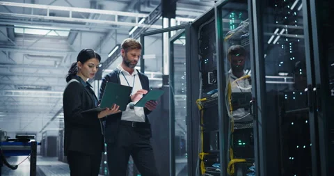 Data Center Two Specialists at Work Stock Footage 320866451
