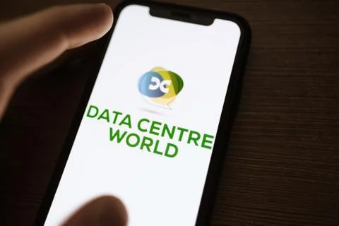 Data centre world logo on the smartphone screen. Stock Photos