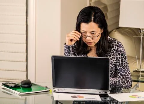 Data check by women on computer Stock Photos