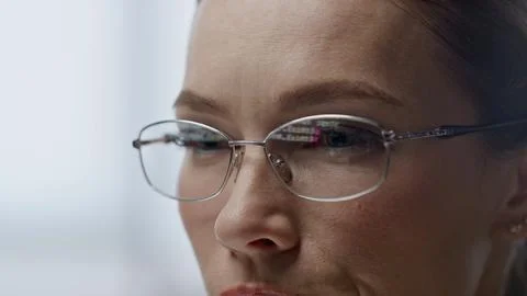 Data code reflecting glasses closeup. Software engineer woman programming work 스톡 사진