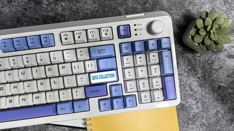 Data Collection write on keyboard isolated on laptop background Stock Photos