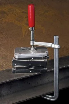 Data compression some hard disk drives compressed with a screw clampin rus... 스톡 사진