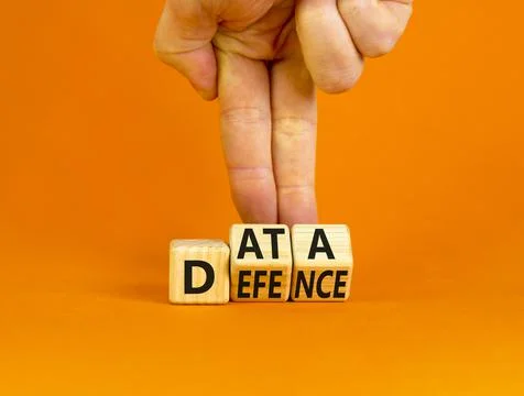 Data defence symbol. Concept words Data defence on wooden cubes. Beautiful or Stock Photos
