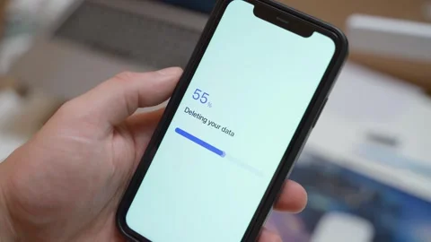 Data deletion progress on smartphone screen ends with deletion failed error Stock Footage 342602984