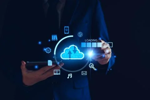 Data download from cloud computing concept. Man using smartphone and comput.. Stock Photos