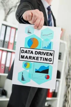Data driven marketing concept shown by a businessman Stock Photos