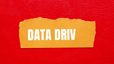 Data Driven message written on ripped torn paper background Stock Footage 317391954