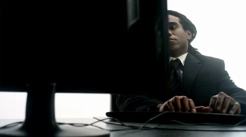 Data Entry Bored: African Male (720p / 23.98) Stockbeeldmateriaal 2441802