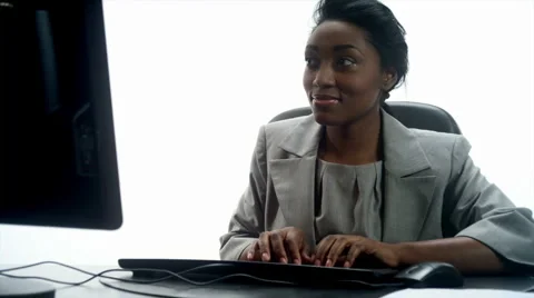 Data Entry Happy: African Female (720p / 23.98) Video stock 2446568